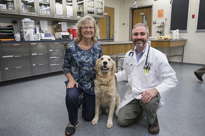 Picture of dog with Purdue Scientists