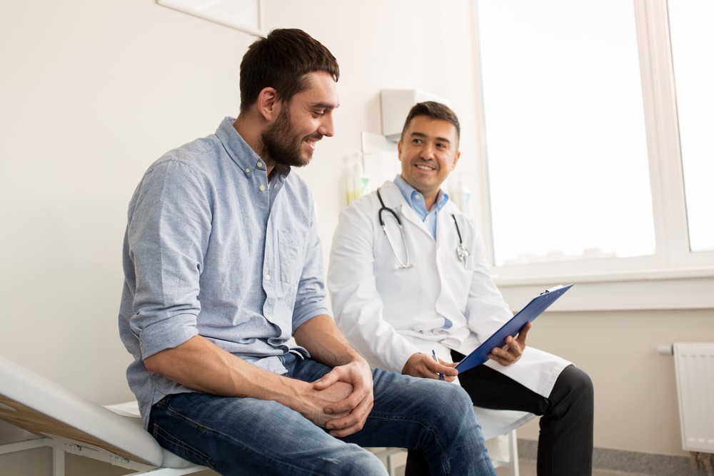 man at doctors office